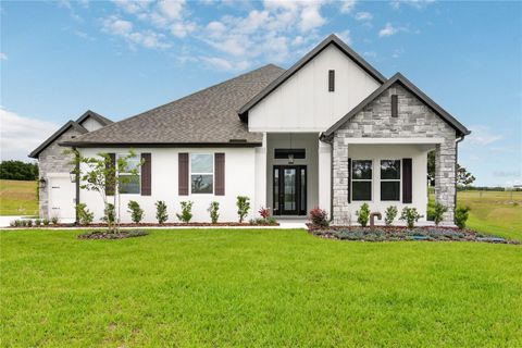 Photo of 3836 Saddle Hill Trail, Fruitland Park, FL 34731 (MLS # G5111458)