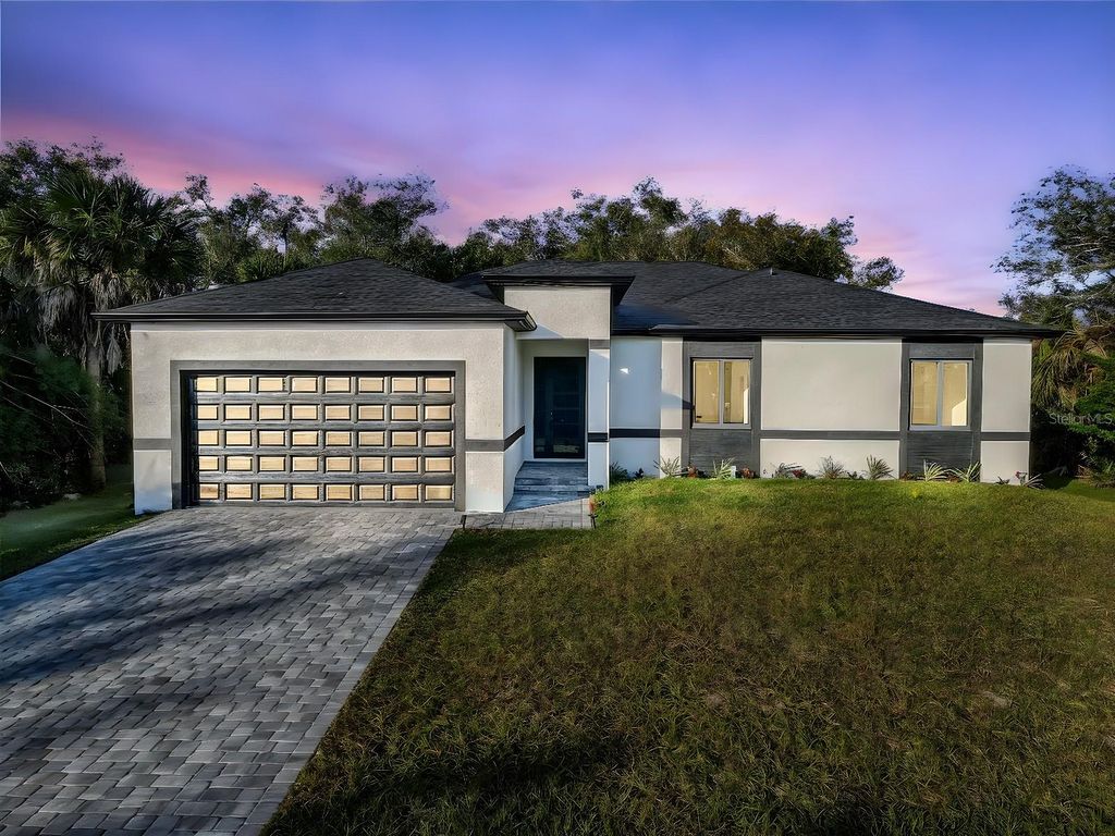 Photo of 493 Sycamore Street, Port Charlotte, FL 33954 (MLS # O6368950)