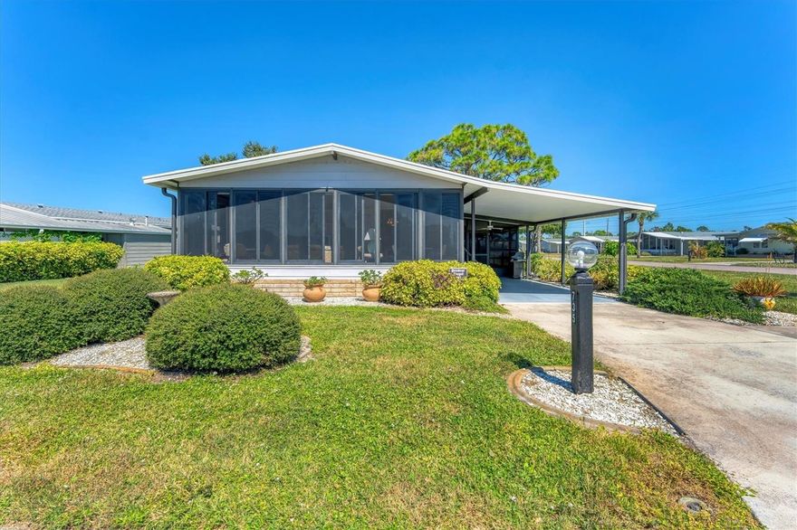 CHARMING TURN-KEY HOME with TROPICAL BREEZES & PALM TREES! Escape the cold & embrace the Florida sunshine you so deserve! This beautifully maintained home has been in the family since 1991 and is fully furnished, and ready for you to move right in. As you arrive, you'll notice the large 12x24 carport, expanded driveway (19x23) which provides ample parking on this oversized corner lot. There's a large (12x26) shed for extra storage. Inside, an open floor plan offers plenty of room for entertaining friends & family, tastefully updated over the years for modern comfort. FEATURES & UPGRADES: FULLY UPDATED KITCHEN - New stove, dishwasher, cabinets & Corian countertops. Upgraded windows, all replaced with single-family home windows (not standard manufactured home windows). STYLISH BATHROOMS: undated counters and an oversized shower in the primary suite. ROOF: New in 2023, oversized hidden gutters, and back flow system in 2024. SPRINKLERS: underground with its own well. FLOORING: Beautifully upgraded laminate wood flooring throughout home. WASHER & DRYER, NEW ENTERTAINMENT READY: Movie projector with wiring included. SPACIOUS LANAI AREAS: Front lanai has special windows with custom shades; side lanai - vinyl replaced windows in 2024, ceiling fans in every room for extra comfort. ELEGANT DINING ROOM MIRROR - high end designed for balanced lighting. This home sits on an oversized lot that you own. Tangerine Woods is an active and friendly neighborhood. You won't feel cramped by your neighbors in this complex. Enjoy incredible amenities such as Olympic sized, heated pool and spa, tennis courts, pickle ball, shuffleboard, walking trails & fitness room. Located just minutes from the shops & restaurants of historic Dearborn Street, world class fishing and many golf courses, this home offers an ideal Florida lifestyle. Schedule your showing today!