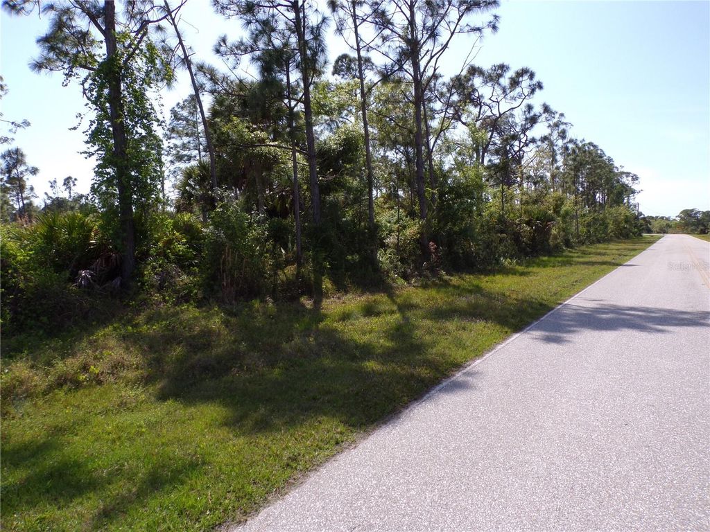 Photo of 12067 Van Lenten Boulevard, Port Charlotte, FL 33981 (MLS # C7489802)
