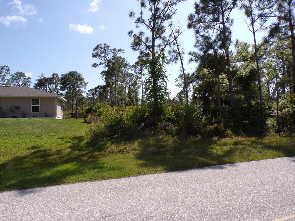 Photo of 12067 Van Lenten Boulevard, Port Charlotte, FL 33981 (MLS # C7489802)
