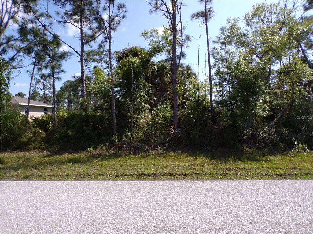 Photo of 12067 Van Lenten Boulevard, Port Charlotte, FL 33981 (MLS # C7489802)