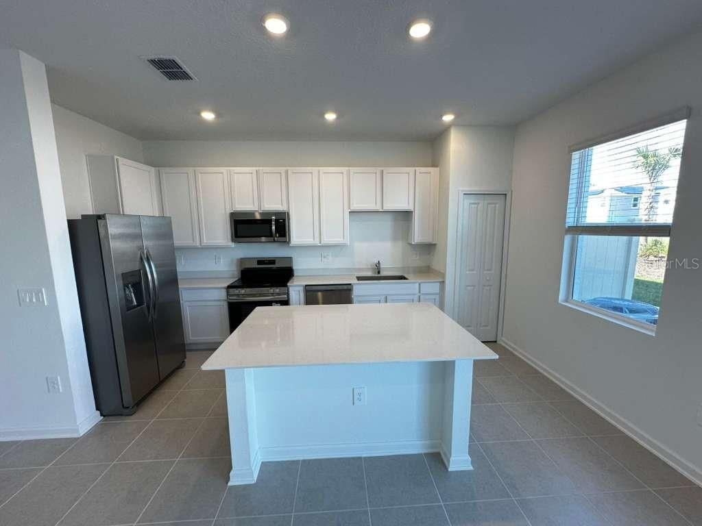 Photo of 2713 Skyline Loop, Kissimmee, FL 34758 (MLS # O6364310)