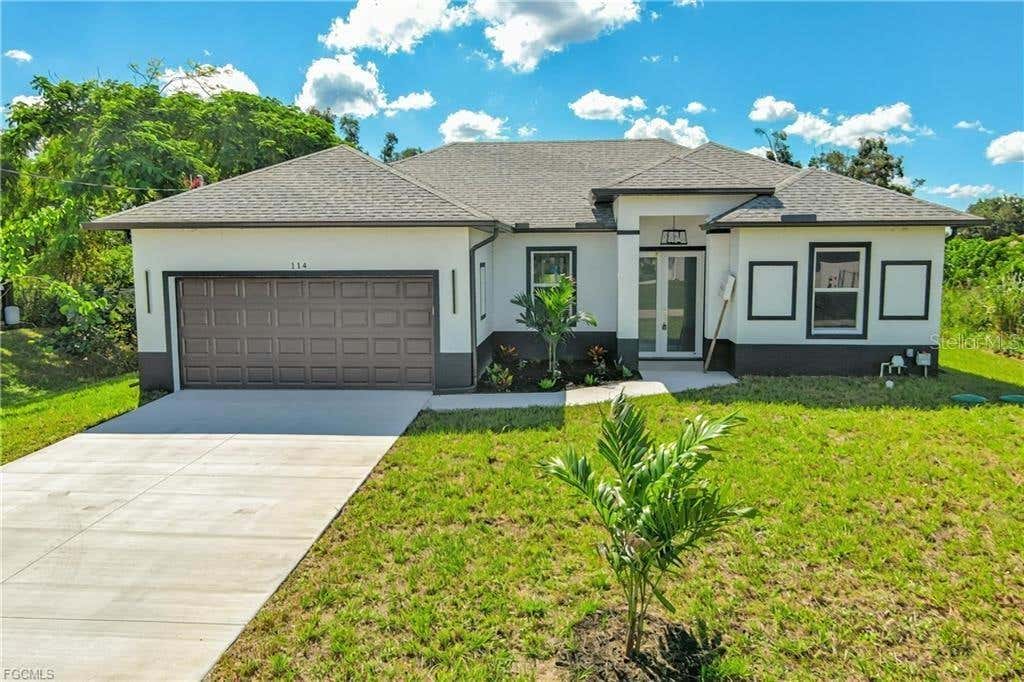 Photo of 114 Preston Street, Lehigh Acres, FL 33974 (MLS # O6432074)
