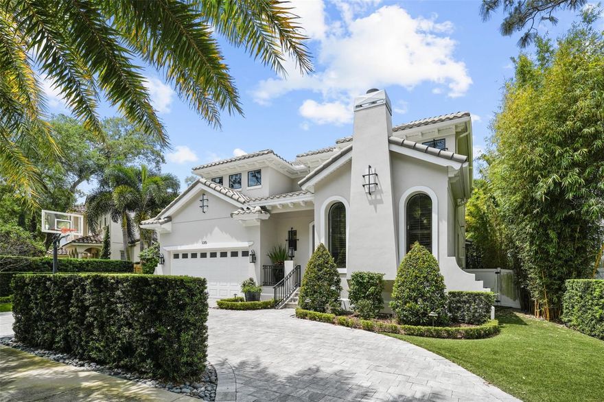 Welcome to this exceptional opportunity! Situated on an idyllic street in the highly sought after, Sunset Park, awaits your new home. You will love the exceptional style of this 2017 Taralon beauty.  Dubbed the Florence model, it offers a barrel tile roof, wrought iron elements, artful landscape design and grand, arched windows reminiscent of European manors.  As you approach the home along the pavered circular driveway, admire the grand entrance and impressive arched, iron door.  Upon entering, note the high ceilings, wood floors, and crown molding throughout the home.  The open floor plan between the formal dining room, kitchen, and family room provides a great flow for parties. Seeking more intimate conversations? Retire to the formal living room off the entry.  This unique space offers a gas fireplace and vaulted ceilings with wood beams.  To the left of the entry is a small office and half bath.  The formal dining room is connected to the kitchen by a butler’s pantry with wine fridge and large walk in pantry.  Guests will love sitting at the vast island and visiting with the chef.  And the chef will love preparing amazing meals on the JennAir gas cooktop.  Need a double oven?  It’s here!  Other features include a paneled refrigerator, microwave drawer wood cabinets and quartz counters.  There is also a breakfast nook for informal meals. The family room offers another fabulous setting to entertain, with high ceilings and wood beams.  But the true gift of this home is the ability to open the French doors and take the party outside.  The screened in lanai is larger than the family room!  It provides plenty of space for a couch and a table and can be enjoyed year-round.  The steps lead to a saltwater pool and spa.  Thanks to the bamboo landscape, you can relax and enjoy your back yard in privacy.  Both sides of the pool have turf for low maintenance.  There is a full pool bath that leads to a fantastic bonus room that could be a 5th bedroom if needed.  There is also a mudroom off the oversized two car garage with added storage.  The garage features space for two cars and plenty of shelves, a kayak pulley and multiple bike racks.  Upstairs, find the primary bedroom, featuring a tray ceiling, wood floors, and a spacious closet with an enhanced shelving system.  The primary bath offers a dual sink vanity with a tower cabinet, walk-in shower and soaking tub.  Completing the upstairs are three more bedrooms, one with an attached bath and another with a sizable jack and jill.  All have walk in closets with shelving systems.  The laundry room provides plenty of cabinets, a sink and stone counters.  Other features include two tankless gas hot water heaters, a whole house water filtration system, whole house wireless audio system, and pre-wiring for security.  Located on a quiet street in one of the best neighborhoods and zoned for A rated schools, this home is exceptional in every way!  Schedule your showing today!