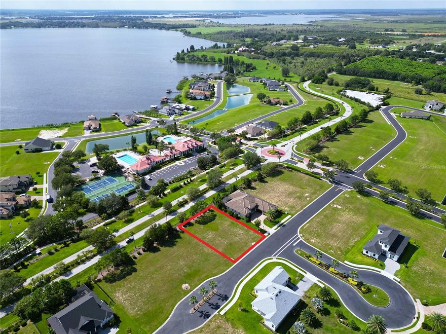 Build your dream home on this spacious lot located in the sought-after Water Ridge Community. Perched at one of the highest elevations in the neighborhood, this property offers breathtaking views of Lake Alfred and the scenic surrounding countryside. Enjoy resort-style living with access to top-notch amenities, all within a serene and beautifully maintained gated community. Water Ridge is a one of a kind, upscale, gated community, situated amongst 3 lovely lakes. The community itself provides great amenities such as multiple tennis and pickleball court complexes, 3 pools, boat ramps, access to all 3 lakes, gym facilities, boat storage, community fishing docks and a beautiful club house. It is conveniently located between Tampa and Orlando off the I-4. Close to Universal Studios, Disney Parks, Adams Estates, Shopping, Restaurants and much more!
