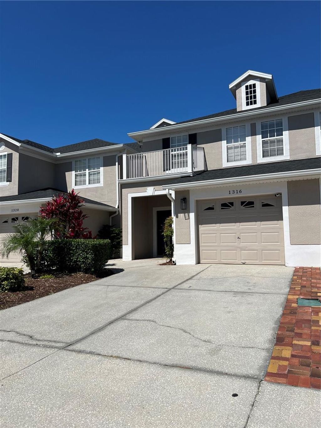 Photo of 1316 Falling Star Ln, Orlando, FL 32828 (MLS # O6377437)