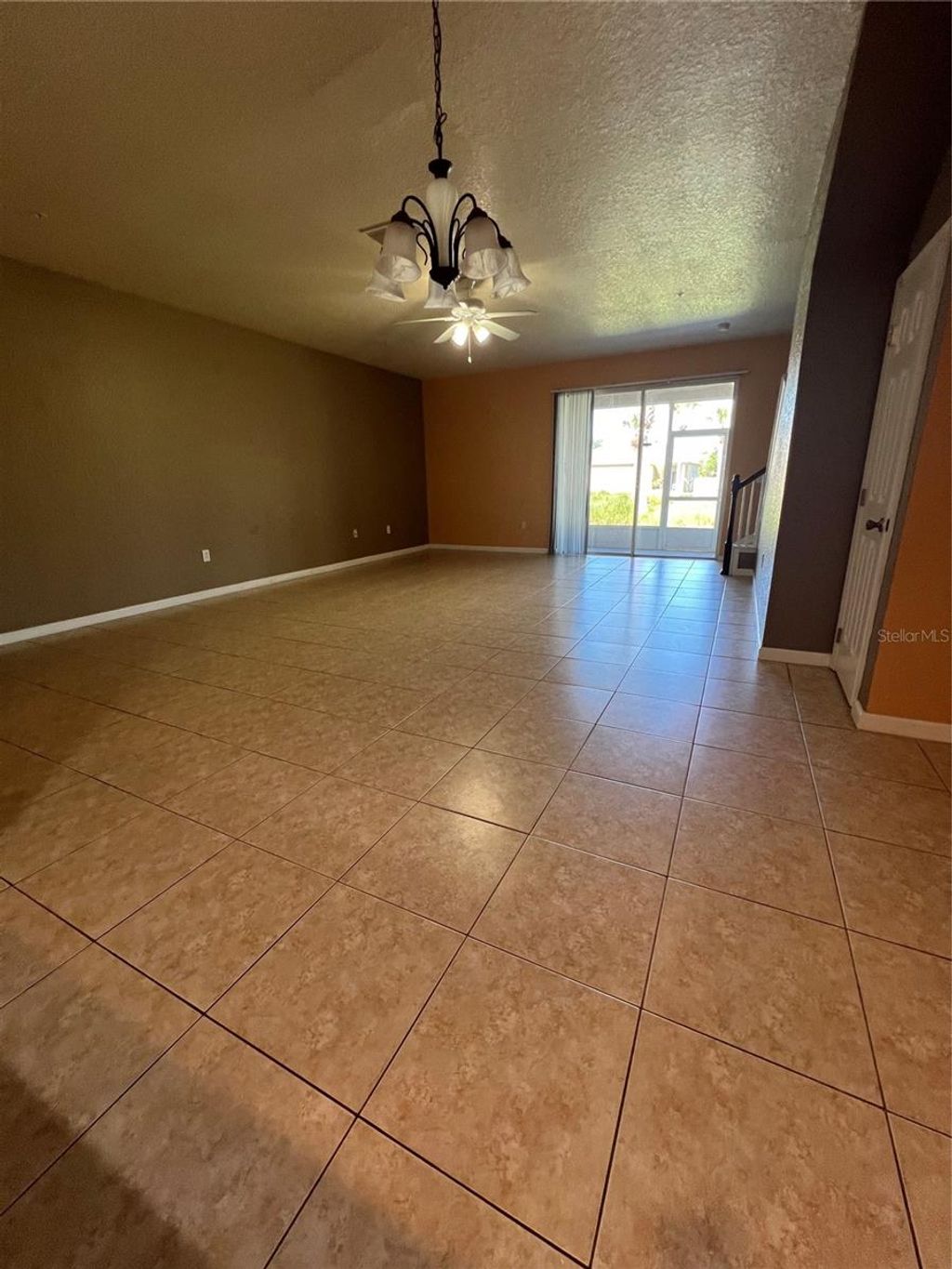 Photo of 1316 Falling Star Ln, Orlando, FL 32828 (MLS # O6377437)