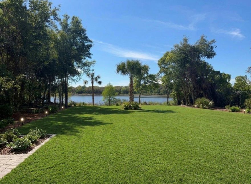 One or more photo(s) has been virtually staged. ONE OF A KIND! Stunning Renovated Lakefront Home on Private Peninsula – Welcome to your fully reimagined lakefront retreat at 1444 Bird Road in the heart of Winter Springs. Nestled along the serene shores of Lake Tony, this highly detailed, professionally rehabbed home blends modern luxury with timeless Florida charm. From the moment you arrive, you’ll notice the thoughtful craftsmanship and attention to detail throughout. The home has been completely renovated from top to bottom, featuring a bright, open-concept layout with abundant natural light and stunning lake views from multiple living spaces. The designer kitchen is a true centerpiece, showcasing amazing cabinetry, premium quartz countertops, stainless steel appliances, and a spacious island perfect for entertaining. The living and dining areas flow seamlessly, creating an inviting space for gatherings or quiet evenings overlooking the water. Retreat to the primary suite, where you’ll find a spa-inspired bathroom with high-end finishes, elegant tile work, and a relaxing atmosphere designed for comfort. Additional bedrooms offer flexibility for guests, family, or a home office. Step outside to your private backyard oasis, where you can enjoy peaceful mornings or breathtaking sunsets on Lake Tony. Whether you’re kayaking, fishing, or simply unwinding by the water, this property offers the ultimate lakefront lifestyle. Additional upgrades include updated systems, modern fixtures, and quality finishes throughout—providing peace of mind and move-in-ready convenience. Located in a desirable Winter Springs neighborhood with easy access to top-rated schools, parks, shopping, and dining, this home is a rare opportunity to own a turnkey lakefront property. Don’t miss your chance to experience luxury living on Lake Tony—schedule your private showing today.