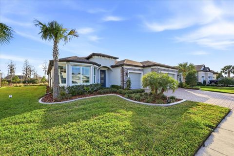 Photo of 5356 Blue Crush Bend, Land O Lakes, FL 34638 (MLS # TB8466213)