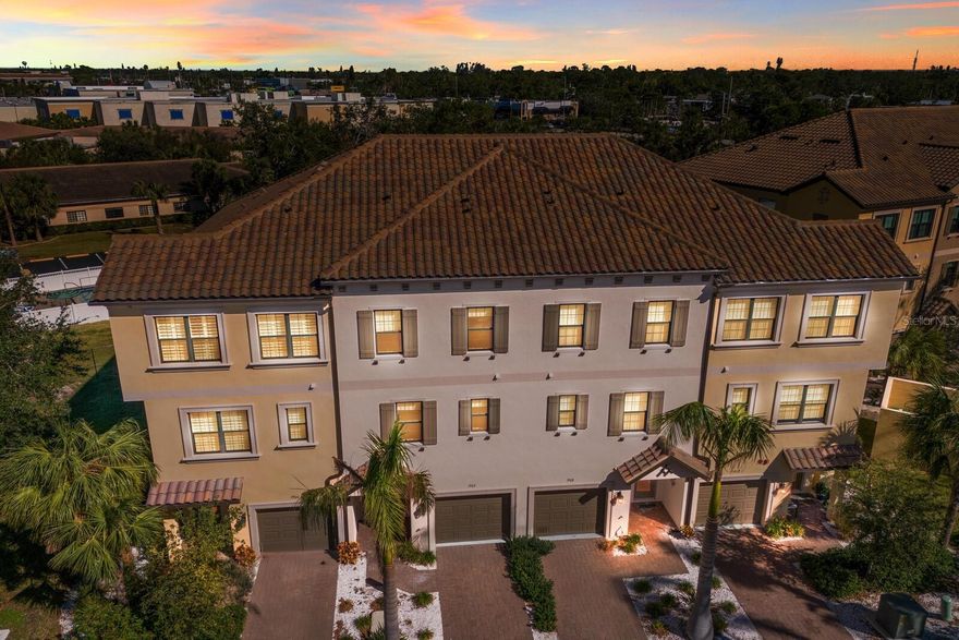 One or more photo(s) has been virtually staged. SELLER MOTIVATED!!! WELCOME HOME to this STUNNING 4 bedroom, 3 bath, 1,745 sq ft townhouse in the gated, WATERFRONT community of Phillippi Landings!!! With 3 stories of thoughtfully designed living space and a tandem 2 car garage, this home offers a perfect blend of LUXURY, convenience, and versatility. As you enter the first floor through the foyer, you'll find access to the garage, complete with a private elevator for easy transportation of groceries and heavy items to ALL 3 levels. A screened in lanai off the garage provides a private outdoor retreat on the ground floor. The second floor offers an open floor plan which includes a beautifully upgraded kitchen and living room combo. The kitchen features quartz countertops, upgraded cabinetry, a farmhouse sink, glass tile backsplash and SLEEK stainless steel appliances. The living room opens to a private, screened lanai with an added privacy screen, perfect for relaxing or entertaining. A versatile bedroom, currently equipped with a custom wall Murphy bed, offers the option to be used as a den or multi-purpose space. A full bathroom is also located on this floor for convenience. The third floor is where you will find the SPACIOUS master suite which boasts a custom walk-in closet and a LUXURIOUS ensuite bathroom with dual sinks and a glass walk-in shower. Two additional bedrooms with custom built-in closets share a full bathroom with a tub. The laundry room is conveniently located on this level, just steps from the bedrooms. This BEAUTIFUL home is also equipped with a water filtration system, ensuring clean and safe water throughout. Phillippi Landings offers a resort-style lifestyle with a pool and spa, fitness center, clubhouse, dog park and walking trails along scenic Phillippi Creek. Boating enthusiasts will appreciate the private fishing and boat docks, kayak racks with a launch, and the option to purchase a boat slip. In a PRIME location, just West of the trail, this community is minutes from the world renowned, #1 beach in the USA - SIESTA KEY BEACH, Sarasota's vibrant cultural scene, fine dining, shopping, the Ringling Museum, Opera and much more. Experience the best of Florida living in this METICULOUSLY maintained home and community. Don't wait to make this YOUR home and begin your FLORIDA Lifestyle!