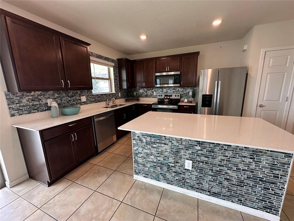 Photo of 630 Citrus Isle Boulevard, Davenport, FL 33837 (MLS # O6355899)