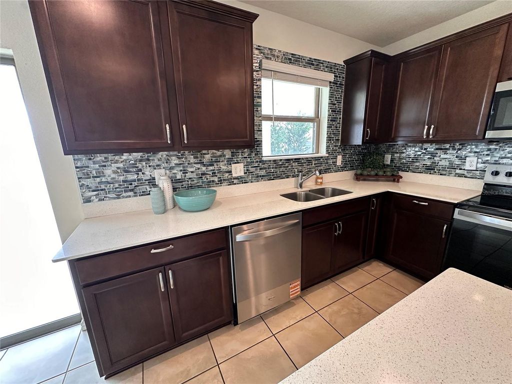 Photo of 630 Citrus Isle Boulevard, Davenport, FL 33837 (MLS # O6355899)