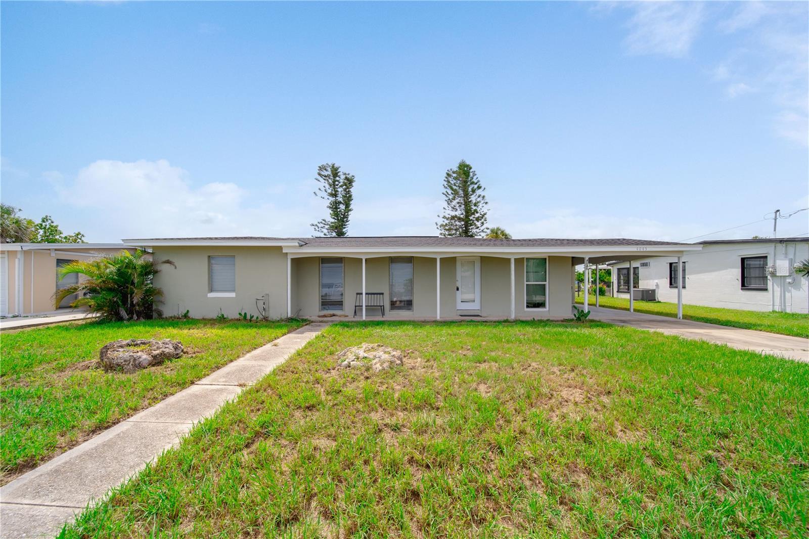 Waterfront Opportunity in Port Charlotte. Welcome to 4045 Conway Blvd, a well-maintained 3-bedroom, 2-bath waterfront home offering excellent value and potential. Situated on a canal with direct water access, this spacious residence provides a solid foundation for your personal updates or future enhancements. The home features a functional layout with generous living areas and comfortable bedrooms, making it ideal for full-time living, seasonal use, or as an investment property. Enjoy peaceful water views and the convenience of canal-front living. Located just minutes from shopping centers, grocery stores, medical facilities, and a variety of local restaurants, this home combines comfort with convenience. Whether you're dining along US-41, picking up essentials, or exploring nearby parks and marinas, everything you need is within easy reach. With its prime location this property presents a wonderful opportunity to enjoy the Florida lifestyle at an affordable value.