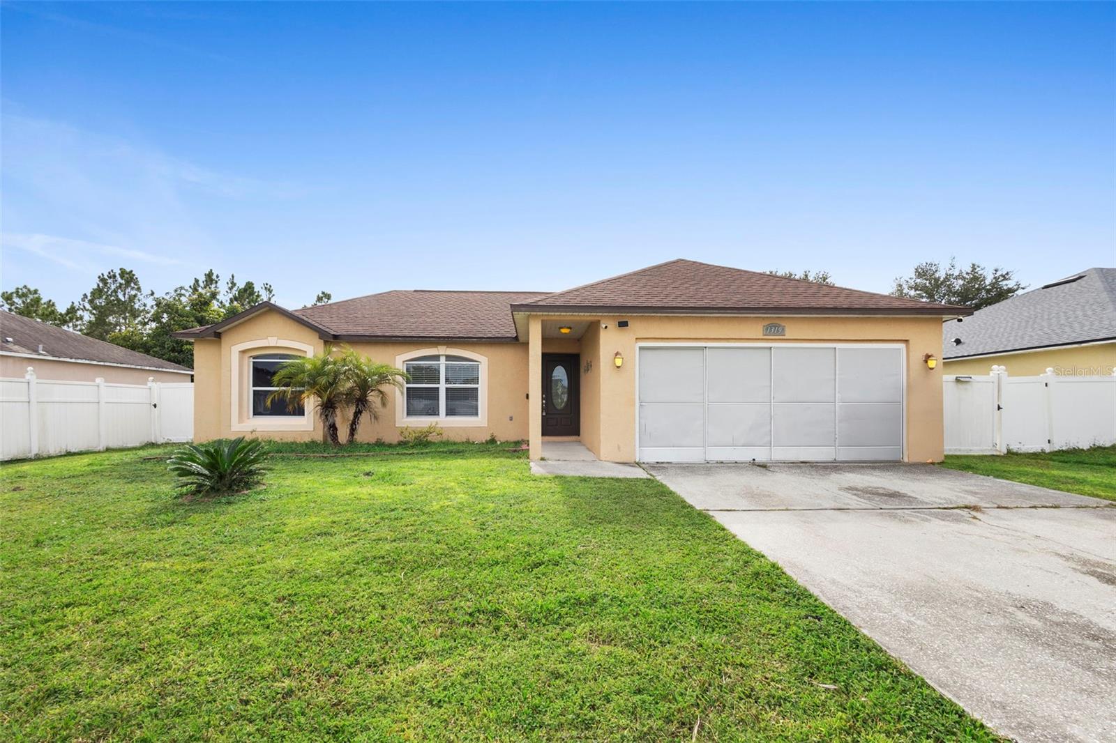 Welcome to this well-maintained 3-bedroom, 2-bathroom home in a convenient Kissimmee location. Featuring a new AC (2024) and a new roof (2021), giving you peace of mind for years to come. This home blends comfort, convenience, and value, making it a solid investment or an excellent choice for your first home. The kitchen features granite countertops and flows seamlessly into the living area, making it perfect for everyday living and entertaining. CERAMIC TILE flooring throughout adds durability and easy maintenance. Enjoy a completely fenced backyard with no rear neighbors, offering privacy and plenty of space for outdoor activities or gardening. Located on a quiet street, the property is close to the bus line, shopping, and main roads, ensuring easy access to daily conveniences. Contact me today for a private viewing. *The owners are in the process of moving.