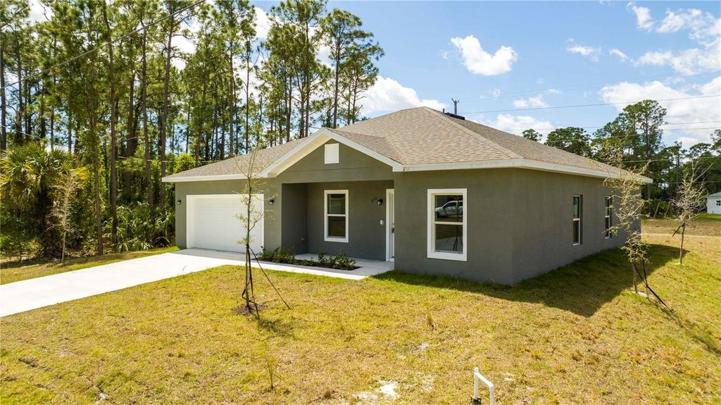 Photo of 971 Wellington Street SW, Palm Bay, FL 32908 (MLS # O6376851)