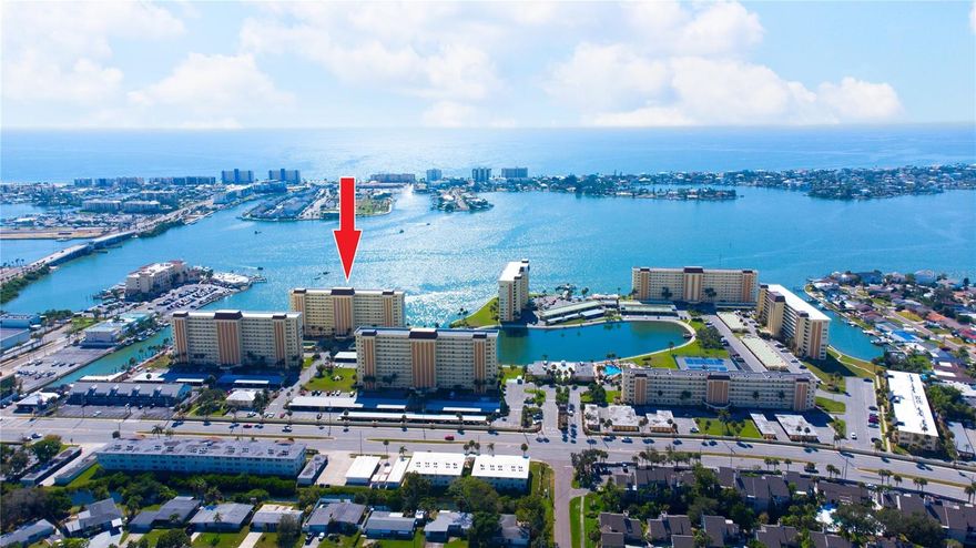: **Welcome to the Serene Waterfront Retreat in the Prestigious 55+ Sea Towers Community!**

Step inside this enchanting one-bedroom, one-and-a-half-bath condominium, complemented by a versatile Florida room that offers the perfect space for a second bedroom or home office. This immaculate unit showcases recent upgrades including luxury vinyl flooring a brand new AC system and water heater, ensuring your comfort from the moment you move in.

The heart of this home is the spacious kitchen, featuring elegant wood cabinetry, a new refrigerator, and pristine white appliances, all illuminated by an abundance of natural light. The open floor plan gracefully extends into a generous living and dining area, boasting expansive picture windows that frame breathtaking views of the tranquil Boca Ciega Bay. For peace of mind during storm season, the unit is equipped with sturdy hurricane shutters.

Retire to the substantial master bedroom, which offers ample room and additional storage solutions, complemented by an ensuite bathroom for privacy and convenience. A guest bathroom is conveniently situated off the foyer, ideal for visitors.

Beyond the walls of this inviting home lies a vibrant community tailored specifically for active adults. Dive into one of the heated pools, challenge friends at the tennis or pickleball courts, or engage in a friendly game of shuffleboard. Numerous social gatherings foster a close-knit community atmosphere.

Anticipation is building as the community clubhouse undergoes a stylish remodel to include a fully equipped gym, billiards area, and a lively activities zone, all overlooking the picturesque lagoon. Additionally, the marina is being revitalized and will soon offer both rental and purchase user right options for slips, available in 2026.

This home also includes the convenience of a covered carport, protecting your vehicle from the elements.

Don't miss the opportunity to live in this dynamic, resort-styled environment, where every day feels like a vacation. A life of luxury and relaxation awaits you at Sea Towers! Owner Financing Available!!!