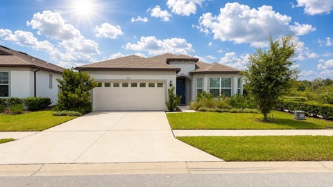 Photo of 957 Silverlake Boulevard, Lake Alfred, FL 33850 (MLS # O6438712)