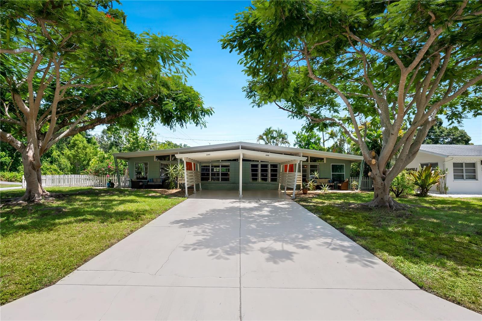 An updated jewel in the heart of Sarasota's historic South Gate neighborhood, this recently renovated and furnished bright home stands as a testament to the mid-century boom that shaped Sarasota. With two bedrooms, one bath and a separate enclosed sunroom/office with sliding glass doors should you need quiet while working, it has it all. Sunroom square footage not included in square footage under air. Lots of windows and skylights allow for natural light to pour inside. Three parking spots, large back patio with short fence and additional separate large 6-foot fenced-in area for large pets, and interior laundry room are all wonderful features. Positioned ideally, the location boasts more than just the city's dynamic arts scene, delectable eateries and beaches. Arlington Park is across Tuttle with public pool, tennis courts, basketball courts, playground, recreational facilities and large park with fountain. $2900/month August-October, $4700/mo November-December, $8000/mo January-April, $3500/mo May-July