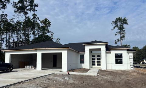 Photo of 73 Ebb Tide Lane, Palm Coast, FL 32164 (MLS # FC313055)