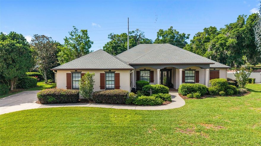 Welcome to this inviting 4 bedroom, 3 bath home with 2 car garage inside a desirable gated community in SE Ocala. From the moment you arrive, the inviting brick paver front porch sets the tone for what’s inside. The home feels light, bright and welcoming with white wood cabinetry throughout, granite countertops and tile flooring in all main living areas, paired with laminate flooring in the bedrooms. Designed with both comfort and privacy in mind, the home features a triple split bedroom floor plan. The 4th bedroom is currently being used as a home office, but can easily be converted to a bedroom if needed. Kitchen has all stainless appliances and opens to a nice sized breakfast which provides a cozy spot for casual meals and morning coffee. The primary suite offers a spacious bath with a garden tub, separate shower and a walk-in closet with built-ins. Plantation shutters and blinds throughout the home add charm while providing privacy. Step outside and enjoy a large, private and fully fenced yard with a sparkling pool, creating the perfect setting to relax or entertain. Just off the back of the home, a screened-in porch offers a peaceful place to unwind while overlooking the pool and backyard. This home is inviting and ready to enjoy both inside and out and you’ll love being just minutes from downtown Ocala, medical facilities and everyday shopping.