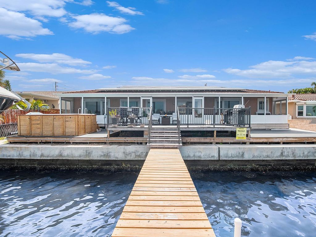 Photo of 1818 Dolphin Boulevard S, St Petersburg, FL 33707 (MLS # TB8344834)