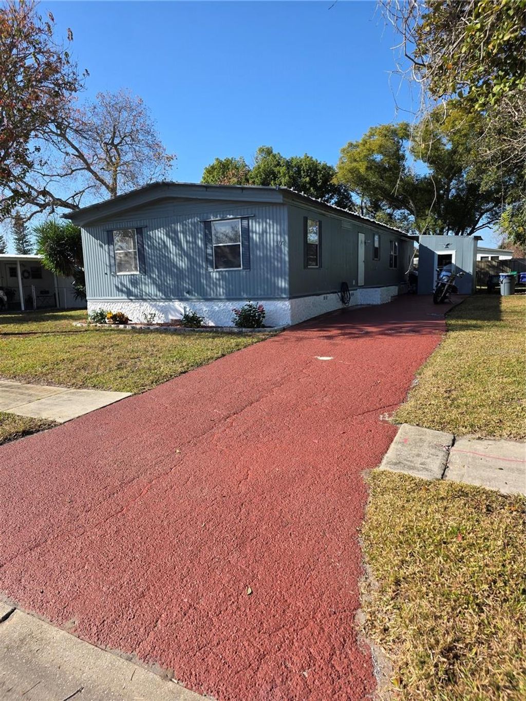 Photo of 102 Barefoot Trail, Port Orange, FL 32129 (MLS # W7881645)
