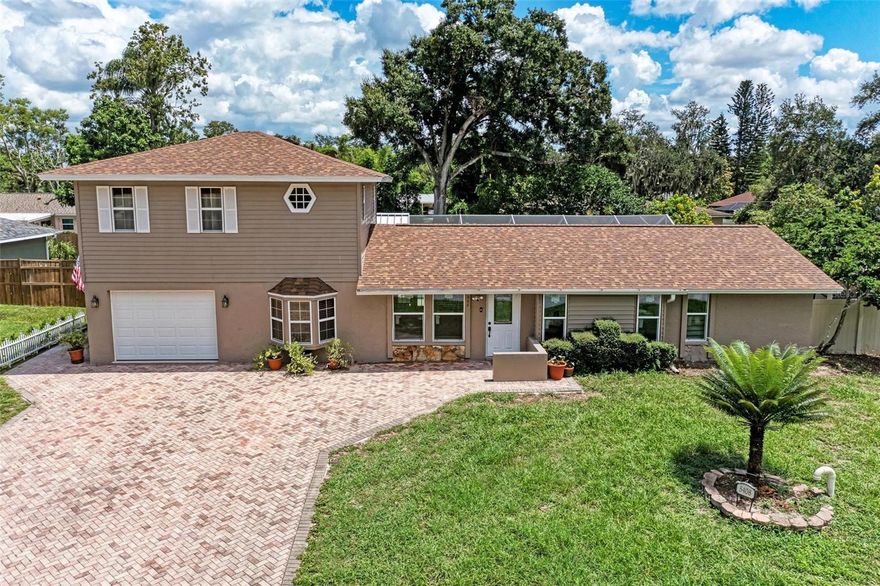 Fun in the Sun! Spacious 5BR/3BA Pool Home in De Soto Lakes – Where Every Day Feels Like a Vacation! Enjoy the best of Florida living in this beautifully updated home near University Park, UTC Mall, Benderson Park, golf courses, and Sarasota’s top beaches. Light-filled open floor plan with bay window dining area, built-in shelving, and stylish finishes. The kitchen features stainless steel appliances, farmhouse lighting, breakfast bar, and ample storage. French doors open to a large screened pool area with new screening—perfect for entertaining or relaxing. Detached building with A/C and power is ideal for a studio or workshop, plus a covered wood deck overlooking the pool and backyard. Two en-suite bedrooms include a spacious primary suite with double vanity and jetted tub. New ceramic tile downstairs, NuCore engineered wood upstairs. Major updates: new roof (2023), new windows (2024), A/C (2017). Brick paver driveway, tropical landscaping, and no HOA! Perfect for Airbnb or enjoying the Florida lifestyle.