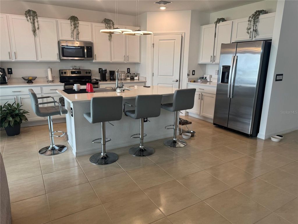 Photo of 80 Citrine Loop, Kissimmee, FL 34758 (MLS # O6325040)