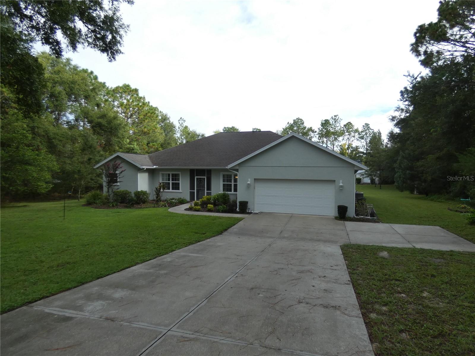 Beautiful 3-Bedroom, 2-Bath Home 1.65 Acres in Rainbow Springs Woodlands
Welcome to this stunning 3-bedroom, 2-bath home featuring a spacious 2-car garage, nestled on a generous 1.65-acre lot in the highly desirable Rainbow Springs Woodlands community.
The home boasts a large primary bedroom with a luxurious en-suite bath, complete with dual sinks and granite countertops. The kitchen is a chef’s dream, offering ample cabinet space, granite countertops, and a smart, functional layout. Tile floors in all wet areas add durability and style. Enjoy seamless indoor-outdoor living with French doors that lead out to a spacious lanai overlooking a gorgeous screen enclosed pool with a hot tub—perfect for entertaining or relaxing in your private backyard oasis.
Don't miss your chance to own this beautiful piece of Florida living!
RAINBOW SPRINGS HOA IS ONLY $246.00 PER YEAR AND INCLUDES ACCESS TO THE RAINBOW RIVER, CLUBHOUSE, COMMUNITY POOL, TENNIS COURTS, PICKLEBALL, BILLIARDS ROOM, EXERCISE ROOM, AND MUCH MORE.