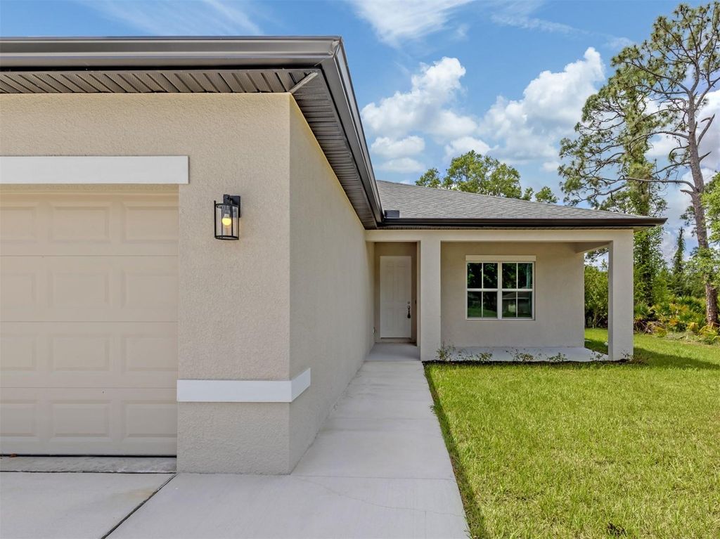 Photo of 1047 Comfort Lane, North Port, FL 34288 (MLS # A4688912)