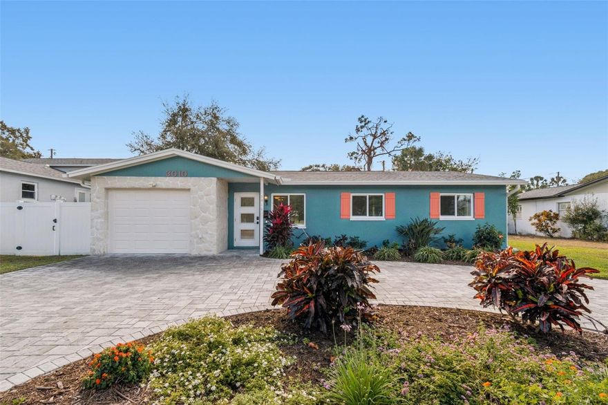 Welcome to this all BLOCK 3 bedroom, 2 full bath home situated in the Pinellas Point, yet NOT in a flood zone. This home offers a circular stone paver driveway, 1 car garage, updated kitchen with solid stone countertops and stainless appliances, Brand new electrical box, tankless water heater, newer roof and a huge fenced in backyard with a large stone patio designed for outdoor dining, firepit and lounging! This property offers a fantastic opportunity to enjoy Florida living with easy access to waterfront parks (Maximo - Free boat ramp), marinas, shopping, dining, and major roadways. Nestled in a quiet, established neighborhood, the home provides a great balance of privacy and convenience, just minutes from downtown St. Petersburg, beaches, and Tampa Bay. Whether you’re looking for a primary residence, vacation home, or investment opportunity, this location delivers endless potential and a relaxed coastal lifestyle.