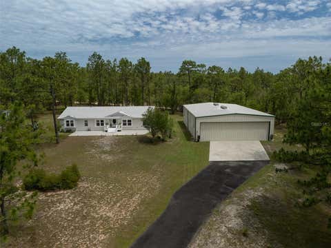 Photo of 267 Melrose Landing Dr, Hawthorne, FL 32640 (MLS # GC540316)