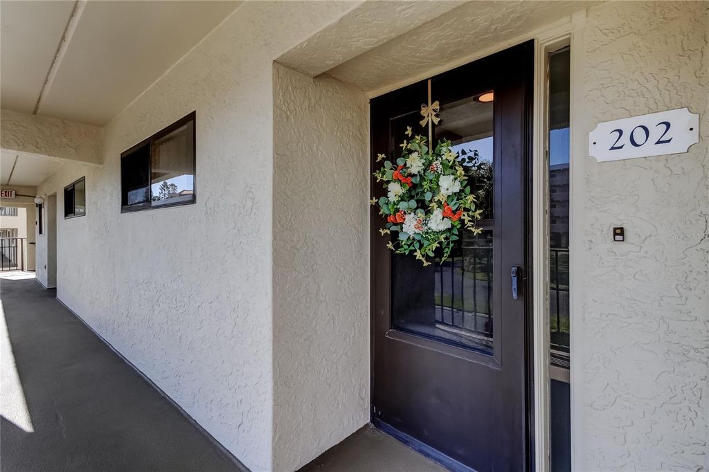 Photo of 9490 Harbor Greens Way #202, Seminole, FL 33776 (MLS # TB8468464)