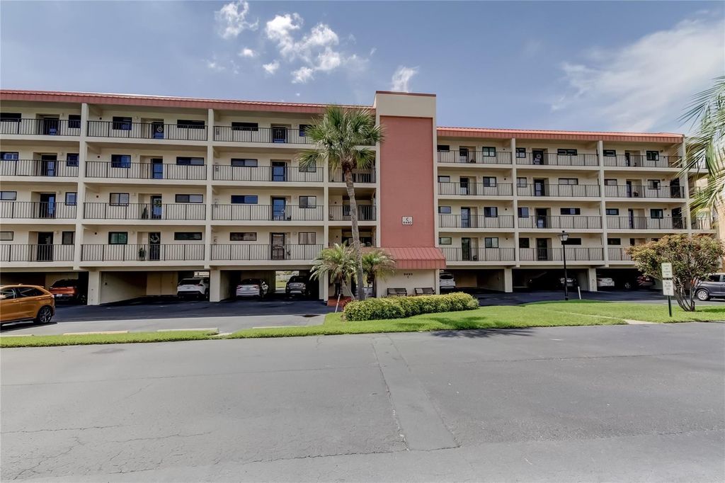 Photo of 9490 Harbor Greens Way #202, Seminole, FL 33776 (MLS # TB8468464)