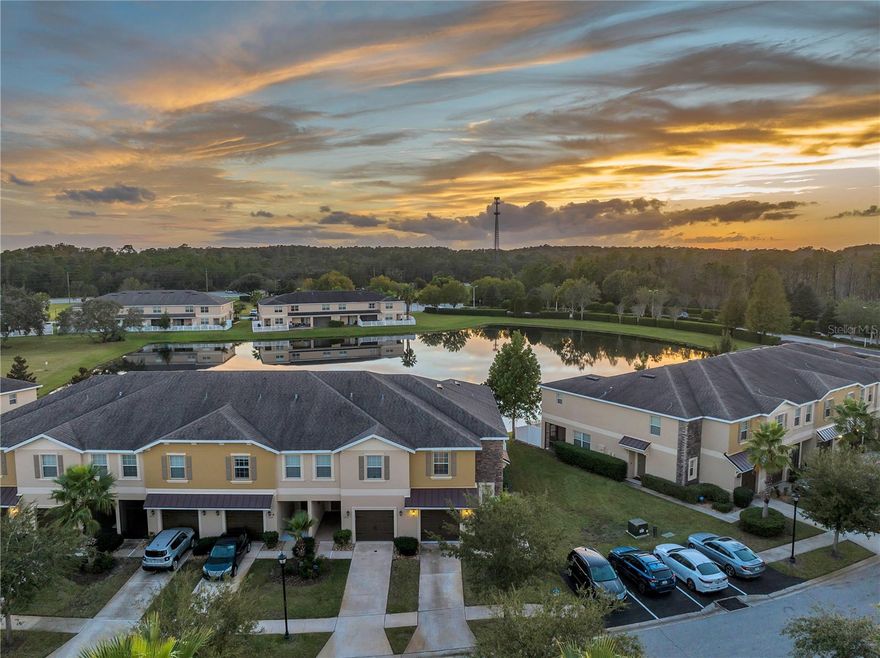 UPDATED Charming Townhome with a WATERVIEW. 3 bedrooms, 2.5 bathrooms, a spacious loft, and a ONE-CAR GARAGE. Just a few short minutes the Suncoast Parkway (Veterans Expressway). Approx. 37-minutes to Tampa International Airport. Fenced in 280 sq. ft. PAVED LANAI. DOWNSTAIRS: open living/dining, built-in desk, coat closet, half bath, and large under-stair storage. UPSTAIRS: all bedrooms, oversized loft, laundry (WASHER & DRYER INCLUDED), and a spacious master suite with DOUBLE DOOR ENTRY, WALK-IN CLOSET, and water view. The Jack-n-Jill bathroom connects two generous guest rooms. UPDATES: 2022 -Full interior paint (including doors/closets), luxury laminate and plank tile flooring, ceiling fans in every room w/ remotes, 70” mounted TV in the living room, TVs in (2) bedrooms, upgraded lighting w/ dimmers, ceiling fans in every room with remotes, soft-close cabinets, remodeled master bath with WATERFALL SHOWER, granite bench & inlay, shoe cabinet in guest room, WHOLE HOME WATER SOFTENER (2025), keyless entry. Maintenance-free living includes water, sewer, trash, & exterior lawn care. Amenities include a COMMUNITY POOL, GYM & CLUBHOUSE. Publix shopping center and amenities minutes from your door. Bike to the Suncoast bike trail or spend a day at the Sunwest Water Park right at your fingertips. There’s something for everyone—marinas, golf courses, Hudson Beach on the Gulf of Mexico with cozy restaurants and daily sunset views, and downtown New Port Richey centered around the Pithlachascotee River, perfect for launching kayaks and paddleboards. Located in a non-flood required zone. HURRICANE SHUTTERS included. Rental can come Furnished OR Unfurnished.