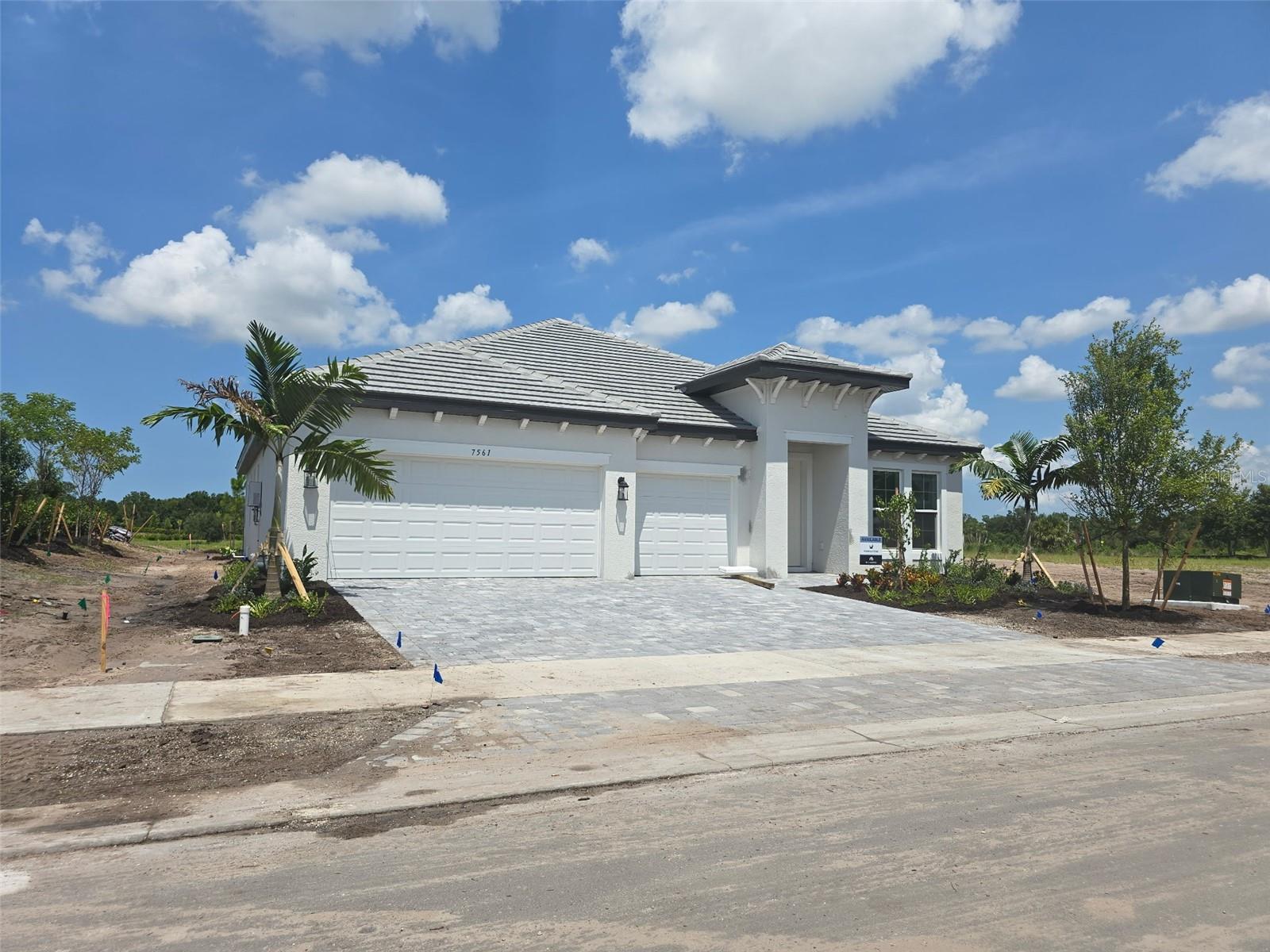 Under Construction. Hawkstone Premium lot with Preserve views–A New Gated Sarasota Community! ****Receive up to $20,000 towards closing costs and SPECIAL FINANCING AVAILABLE FOR A LIMITED TIME ONLY FROM PREFERRED LENDER. RESTRICTIONS APPLY, FOR QUALIFIED BUYERS, SUBJECT TO APPLICABLE TERMS AND CONDITIONS. SUBJECT TO CHANGE WITHOUT NOTICE**** This Crystal floor plan offers 4 spacious bedrooms, 3 full bathrooms, and a 3-car garage, providing ample space for modern living. Built with durability and style in mind, this home features hurricane impact windows, a tile roof, and luxurious quartz countertops throughout. The gourmet kitchen is a chef’s dream, boasting a gas range, premium appliances, and an open-concept design perfect for entertaining. At 2,309 square feet, this single-story home offers a bright and airy layout with high-end finishes and thoughtfully designed living spaces. Each bathroom is elegantly appointed with contemporary fixtures, creating a spa-like retreat for ultimate relaxation. Step outside to enjoy a beautifully landscaped yard, perfect for soaking up the Florida sunshine or hosting outdoor gatherings. Located in Hawkstone, a secure, gated neighborhood, this home provides both privacy and convenience, with easy access to Sarasota’s pristine beaches, dining, shopping, and top-rated schools. Don’t miss the opportunity to own this exceptional New home! Schedule your private tour today.