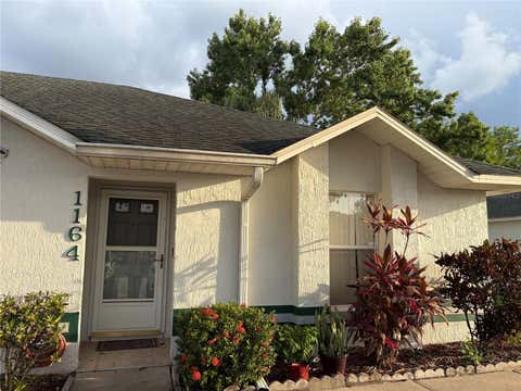 Photo of 1164 Jade East Lane, Kissimmee, FL 34744 (MLS # S5153649)