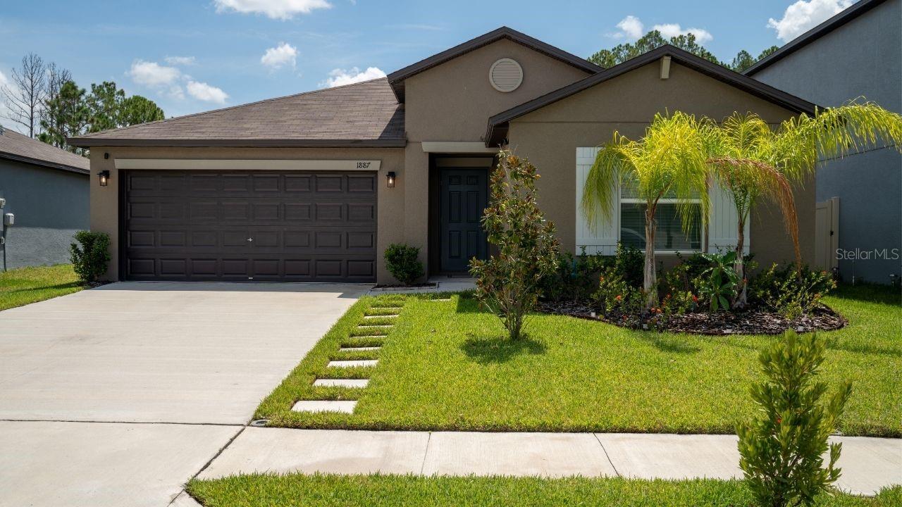 Charming & Spacious Lakeland Retreat – Move-In Ready! Welcome to 1887 Yellow Trail, a beautifully maintained 4-bedroom, 2-bathroom single-family home offering 1,918 sq ft of comfortable living space in the heart of Lakeland. This thoughtfully designed home features a bright and open layout, perfect for both everyday living and entertaining. The kitchen is a chef’s dream with gleaming granite countertops, stainless steel appliances, and ample cabinetry—blending style and functionality effortlessly. The spacious living areas flow seamlessly and are filled with natural light, creating a warm and welcoming atmosphere throughout. The primary suite offers a peaceful retreat with an en-suite bath, while the additional bedrooms provide flexibility for family, guests, or a home office. Every corner of this home reflects meticulous upkeep and pride of ownership. Step outside and enjoy the serenity of a quiet neighborhood while still being close to everything Lakeland has to offer. Minutes from Downtown Lakeland’s shops, restaurants, and the scenic Lake Mirror Promenade. Close to Lake Parker for fishing, boating, and trails. Easy access to I-4 for commuting to Tampa or Orlando. Nearby nature adventures at Circle B Bar Reserve. Short drive to local schools, parks, and shopping centers. Whether you're seeking your forever home or a spacious Florida getaway, this Lakeland gem checks all the boxes. Don’t miss the chance to own this well-maintained, move-in-ready property in a convenient and growing community! Schedule your private showing today and discover the lifestyle waiting for you at 1887 Yellow Trail!