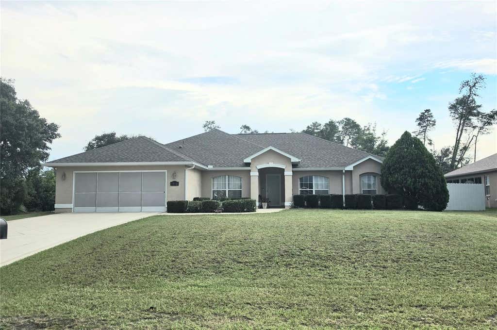 Photo of 3910 SW 103rd Street Road, Ocala, FL 34476 (MLS # OM730807)