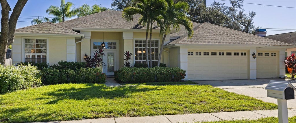 Photo of 433 Pine Warbler Way N, Palm Harbor, FL 34683 (MLS # TB8559897)