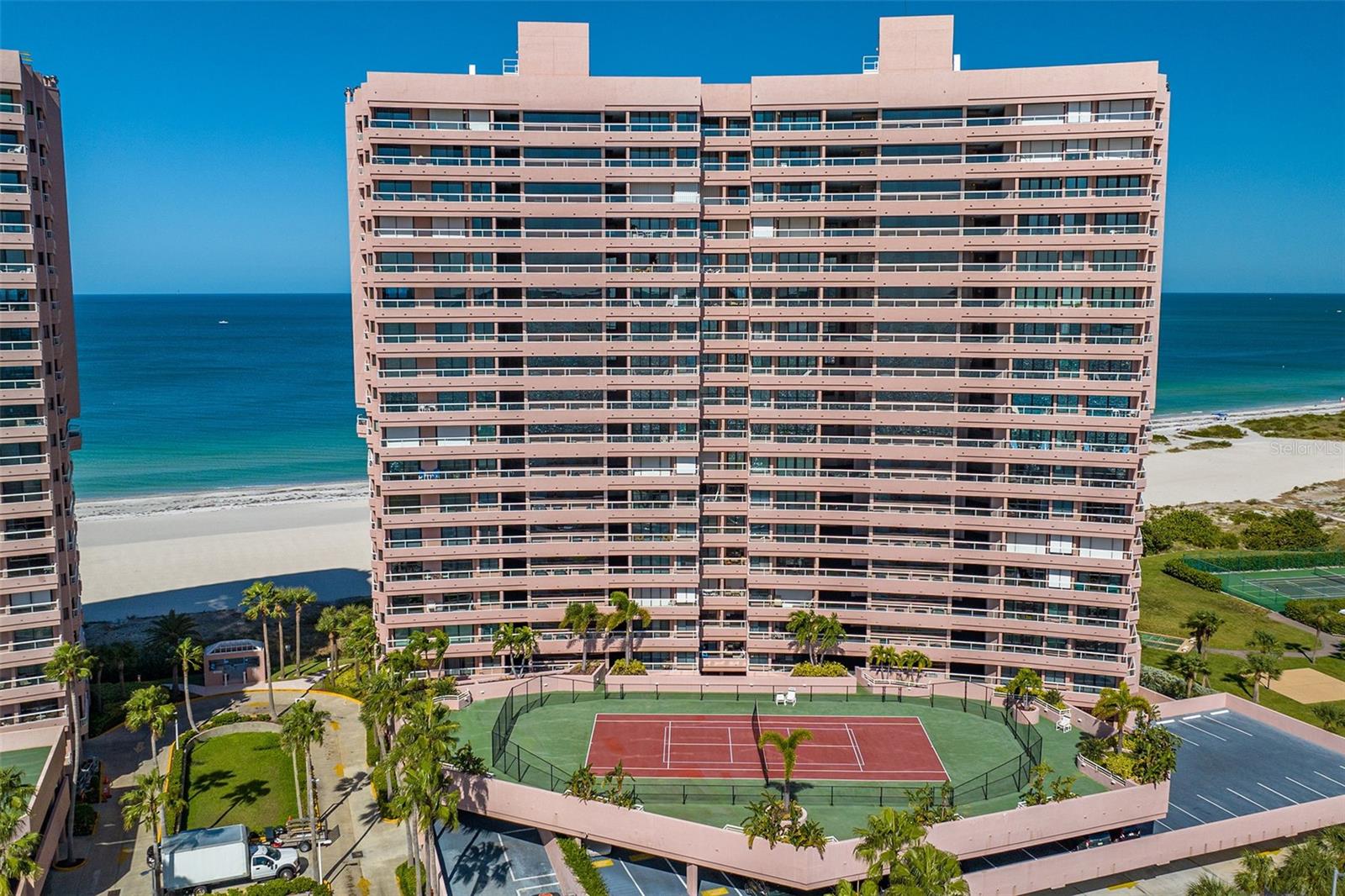 Welcome to CRESCENT BEACH CLUB II DIRECT GULF FRONT! You will feel like you are on a constant vacation in this luxurious upscale Residence! Enjoy unobstructed beachfront views of Sand Key / Clearwater Beach, Crescent Beach Club provides the amenities for a resort-style lifestyle. Ready to move in and enjoy the Florida beach lifestyle! Other features include; Gated community offering 24/7 security, heated saltwater pools & spa (one for each building), tennis, fitness center, billiard room, game room, grilling area, club room and on-site management. Enjoy PRIVATE Beach Access where the sparkling waters of the Gulf and pristine white sands of the Beach! Easy access to public transportation and airports. This exclusive oasis offers unparalleled tranquility and seclusion, perfect for those seeking a SERENE RETREAT. Bask in the beauty of stunning sunset and the gentle sound of waves lapping at the shore. Available January 1, 2026 to June 2026