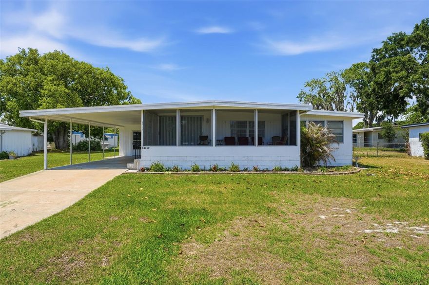 This is a turnkey and well-maintained Manufactured Home located in Western Shores close to the water. Quiet neighborhood with easy access to businesses and shopping. 2 storage areas located under roof. Large screened front porch to enjoy the outdoors.