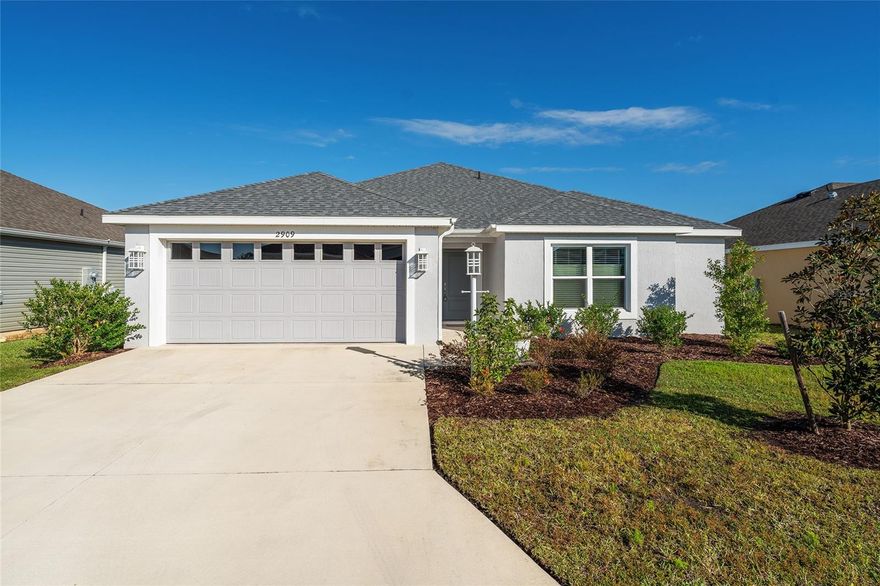 LOCATION, LOCATION, LOCATION! Nestled in the highly desirable VILLAGE OF RICHMOND, this nearly new 3-bedroom, 2-bath “Sequoia” model (built in 2022) is just ½ mile from Brownwood Paddock Square — close to shopping, dining, and the New in ‘25 Harry & The Natives Restaurant! This lovely home features classic block-and-stucco construction, a spacious 2-car garage, and a bright, open-concept floor plan connecting the kitchen, dining, and living areas — perfect for entertaining. PROFESSIONALLY DECORATED with modern & stunning furnishings and decor are sure to please and available for purchase separately. Primary Bedroom Suite located privately away from both front Guest Bedrooms and separated by pocket door for added comfort. Each bedroom includes a walk-in closet, offering plenty of added storage. Inside laundry room off garage only adds to the flow and functionality of this lovely home. Enjoy the north-facing lanai and outdoor living area, providing ample space and potential for outdoor enjoyment. Located well north of the Turnpike, you’ll appreciate the peaceful setting with NO highway noise and NO nearby Powerlines. Walk or golf cart to both the very nearby Richmond Community Pool and Clarendon Recreation Center, offering family pool (Clarendon), pickleball, bocce, outdoor fitness, cornhole, sand courts, a pavilion, and more! Stunning furniture package is available separately. Don’t miss your opportunity to live close to all the exciting new amenities The Villages has to offer — schedule your private showing today!