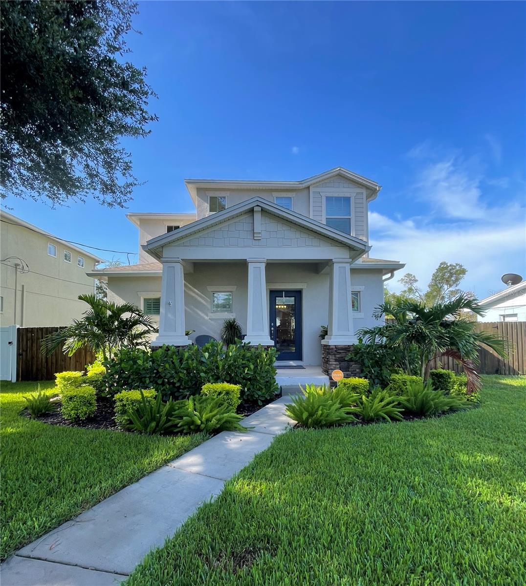 Home is not in flood zone and has NOT been flooded whatsoever. This newly renovated craftsman bungalow located in the heart of Tampa, boasts a variety of interior and exterior upgrades, including a fully remodeled open concept kitchen, fresh paint, storage closets, and many more. For more details, please refer to the list of additional updates.
The home’s entrance features a column decorated with stacked stone and lush, mature landscaping, providing ample natural lighting. The first floor includes a living area, a half bathroom, a kitchen, a master bedroom, and a master bathroom. The master bathroom features a soaking tub, a large shower area, multiple storage spaces, and medicine cabinets. It also has a custom-built walk-in closet with ample space. The kitchen is an open concept with plenty of space for cooking and entertaining. It has a built-in bar storage area that could be removed if needed, ample cabinetry space throughout, modern design, stainless steel appliances, and stunning views of the backyard.
The second floor offers a spacious lounging den that could be converted into a fourth bedroom. There are also two other bedrooms, a laundry room, and a full bathroom with a tub. The backyard is perfect for entertaining and is low maintenance due to its paved surface with decorative block pavers. Mature landscaping, including beautiful roses, jasmine, and bougainvillea, adds to its charm. The home also features a garage that can accommodate two cars, which can be accessed from the back alley. Onof e could modify front for perhaps a driveway (check with city of Tampa for regulations). Home equipped with Hurricane shutters and an irrigation system in the lush front yard.
The house has many other features, including a softer water system, plantation shutters throughout, durable Pergo Timbercraft laminate flooring that is scratch-resistant and easy to clean, and an additional shed for storing tools.
This fully fenced yard is a little urban oasis in the heart of Tampa. It’s close to great hospitals, college, nightlife, restaurants, entertainment venues, and the airport, making it a desirable home for anyone who enjoys life.
Please refer to the list of additional information to see what’s not included in the home sale as some of the Fixtures are not.