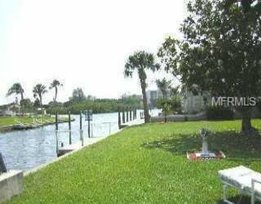 Cul-de-sac, waterfront, partial bay view, next to multi-million dollar homes. Plenty of water for large boats. This is a hot location...Siesta Key and Intercoastal views! Well maintained home would ma ke a great rental.Rent, remodel or build your dream home next to a $4 million plus home.