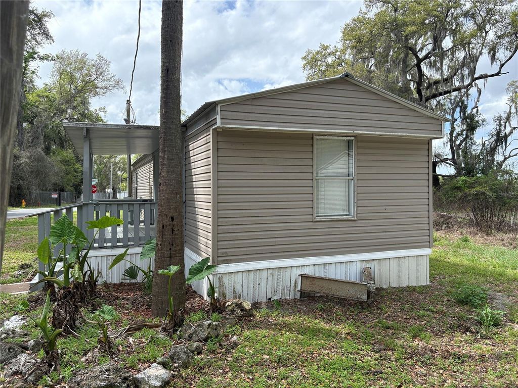 Photo of 654 NW 6th Avenue, Webster, FL 33597 (MLS # G5109688)