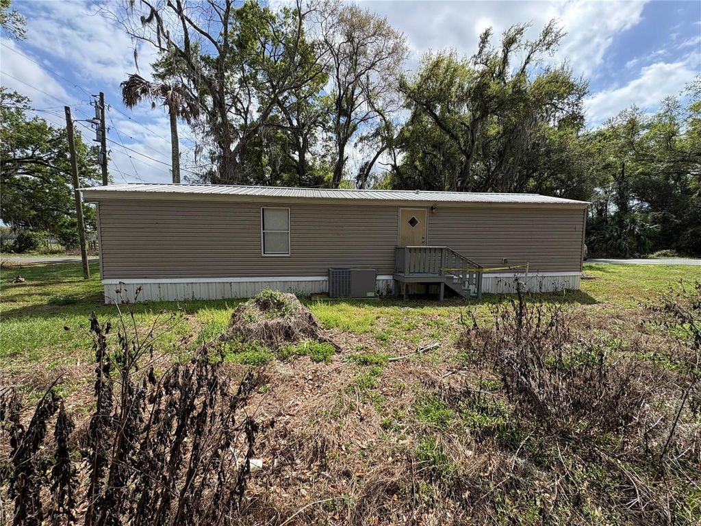 Photo of 654 NW 6th Avenue, Webster, FL 33597 (MLS # G5109688)
