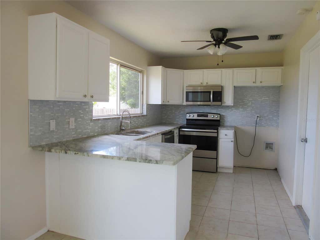 Photo of 11097 Magdalena Avenue, Englewood, FL 34224 (MLS # A4696108)