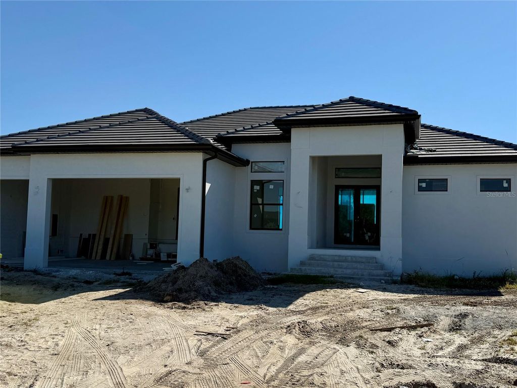 Photo of 15212 Aquarius Circle, Port Charlotte, FL 33981 (MLS # C7518359)